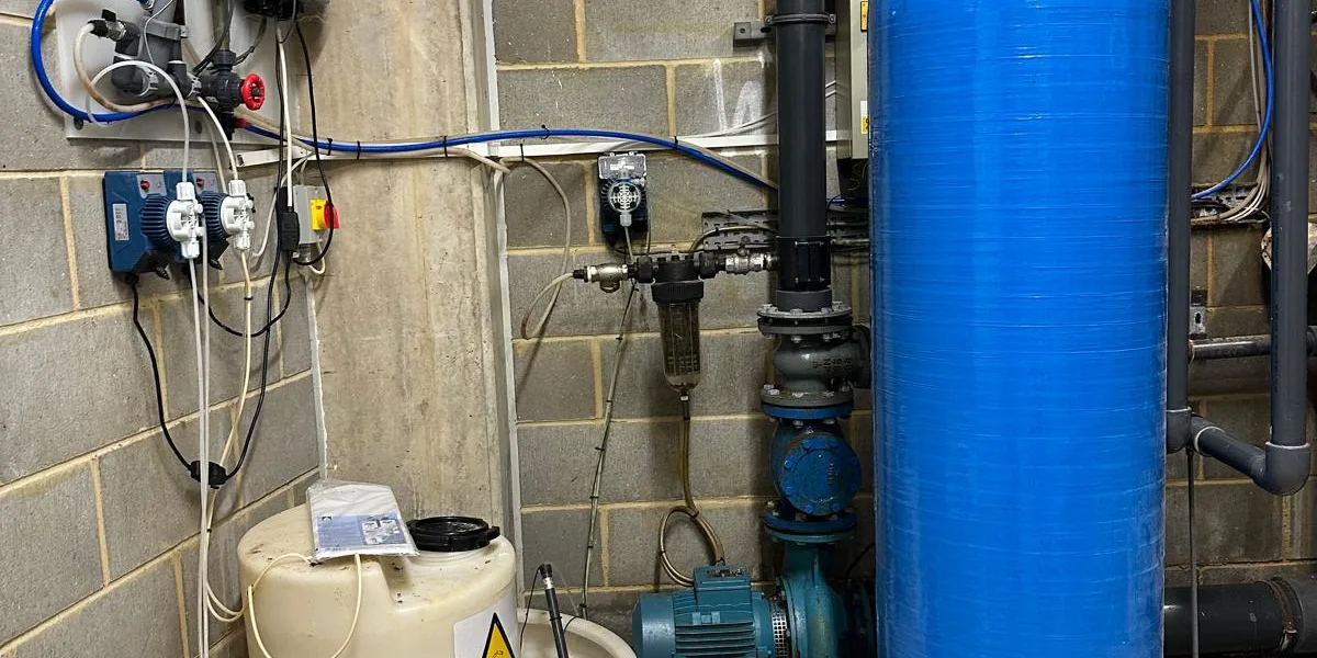Chlorine dioxide dosing equipment and a softener vessel in a plant room