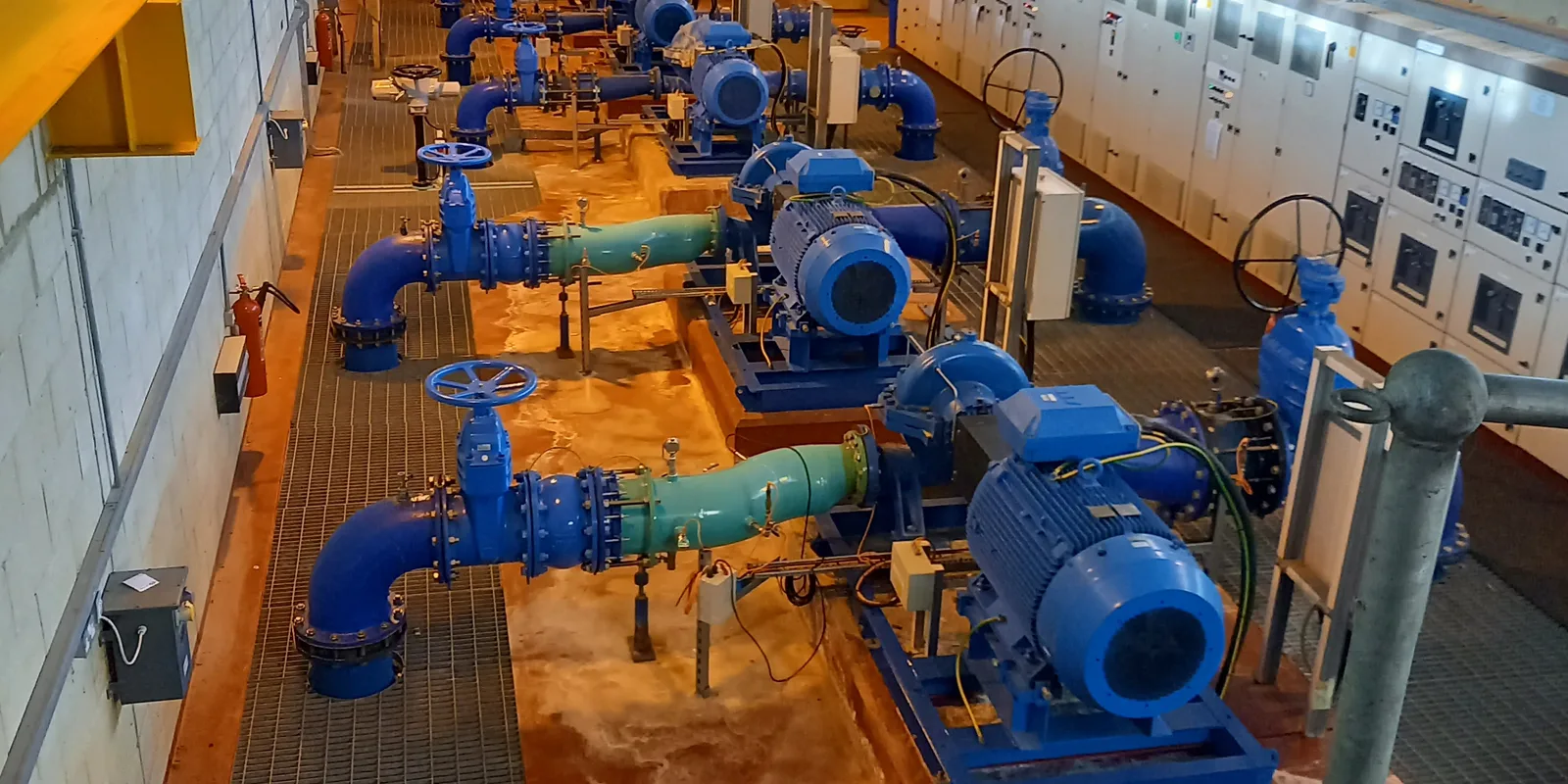 Pumps and motor control panels in a pumping station