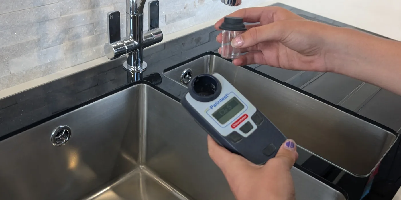 A chlorometer showing a free chlorine reading taken at an outlet